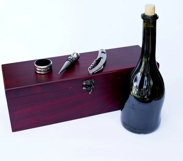 Wooden Vine Hutch with Bottle of Red Vine and Vine Equipment