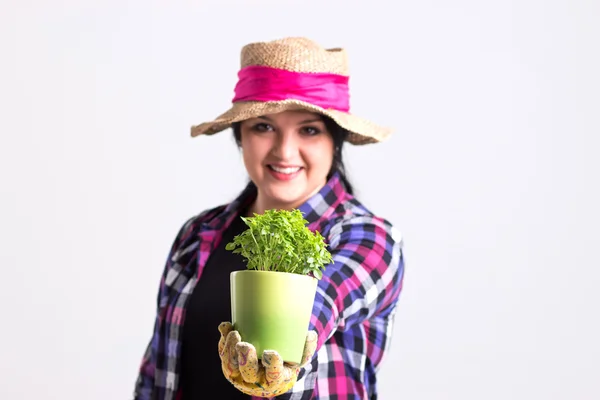 Vrouw in tuinieren outfit — Stockfoto