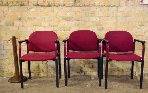 Drei rote Stühle — Stockfoto