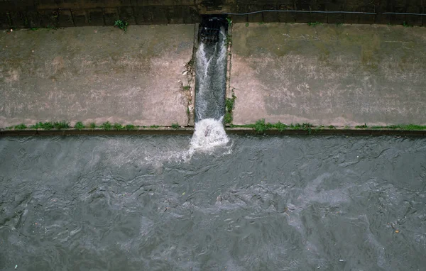 Storm water gushing into the canal after heavy rain, Kuala Lumpur, Malaysia