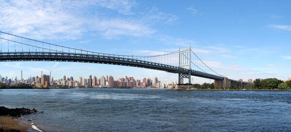 Triborough Bridge, panoramic view from Astoria Park toward northern Manhattan skyline in the background, Queens, NY, USA - October 3, 2021