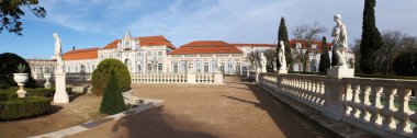 Hanging Gardens of the Palace of Queluz, Ballroom wing in the background, panoramic shot, near Lisbon, Portugal - December 23, 2021