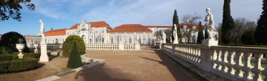 Hanging Gardens of the Palace of Queluz, Ballroom wing in the background, panoramic shot, near Lisbon, Portugal - December 23, 2021