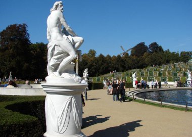 Roman god statue in the park of Sanssouci Palace, Potsdam, Germany - September 23, 2007