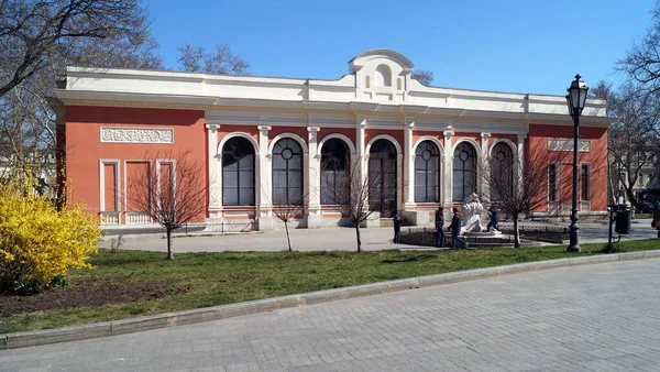 English Club, classical building by Giorgio Torricelli, completed in 1842, later Navy Museum, at Lanzheronivska Street 6, Theater Square facade, Odesa, Ukraine - March 2019