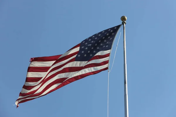 Flag Flying Staff Blue Sky Background — Stockfoto