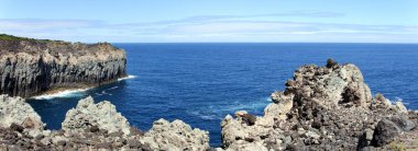 Volcanic lava-formed coastal cliffs at Alagoa Viewpoint, northern coast of Terceira, Azores, Portugal - July 27, 2022