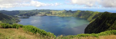 Blue Lake, Lagoa Azul, view from Northern point, Miradouro das Cumeeiras, in Southern direction, panoramic shot, Sete Cidades, Sao Miguel Island, Azores, Portugal - July 31, 2022