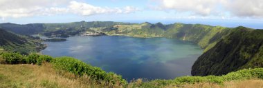 Blue Lake, Lagoa Azul, view from Northern point, Miradouro das Cumeeiras, in Southern direction, panoramic shot, Sete Cidades, Sao Miguel Island, Azores, Portugal - July 31, 2022