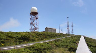 Communications antennae topping the summit of the highest mountain, Santa Barbara, of the Terceira Island in Azores, Portugal - July 28, 2022