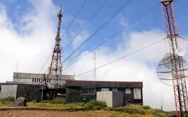 Communications station and antennae on top of the summit of Serra de Santa Barbara, the highest point of Terceira Island, Azores, Portugal - July 28, 2022