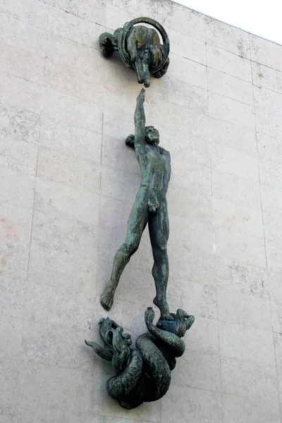 \'Adam\', bronze sculpture by Antonio Duarte, installed in 1969, symbolizing Devine justice, at the building of Tribunal de Justica, Ponta Delgada, Sao Miguel, Azores, Portugal - July 31, 2022