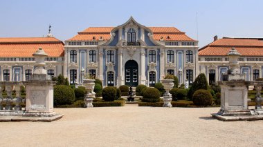 Ballroom wing of the 18th-century Queluz National Palace, view from manicured Malta Garden, Queluz, near Lisbon, Portugal - August 9, 2016