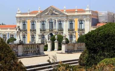 'Ceremonial Facade' of the 18th-century Queluz National Palace, view from manicured Hanging Gardens, Queluz, near Lisbon, Portugal - August 9, 2016