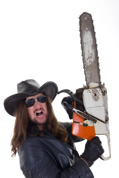 A man with a chainsaw with an expression — Stock Photo, Image