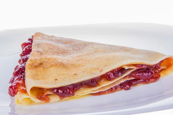 Pancake with strawberry jam — Stock Photo, Image