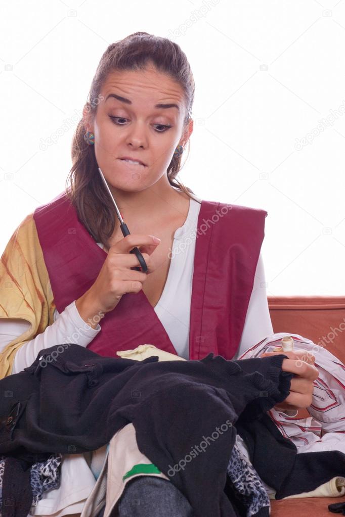 girl preparing to sew and cut fabric