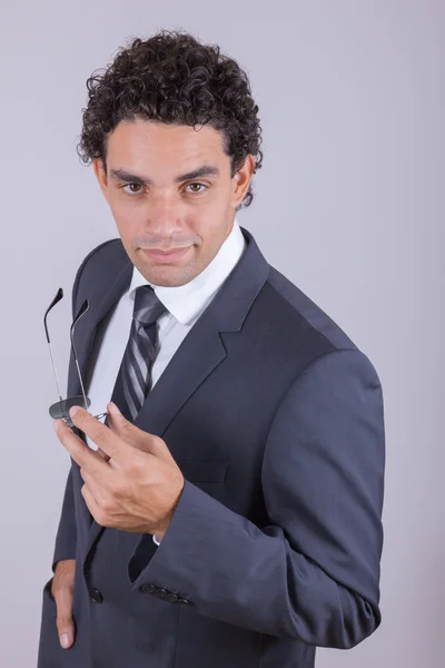 Confident businessman in suit with hand in his pocket — Stock Photo, Image