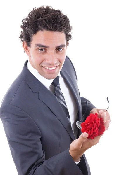 Förförare leende med rose — Stockfoto