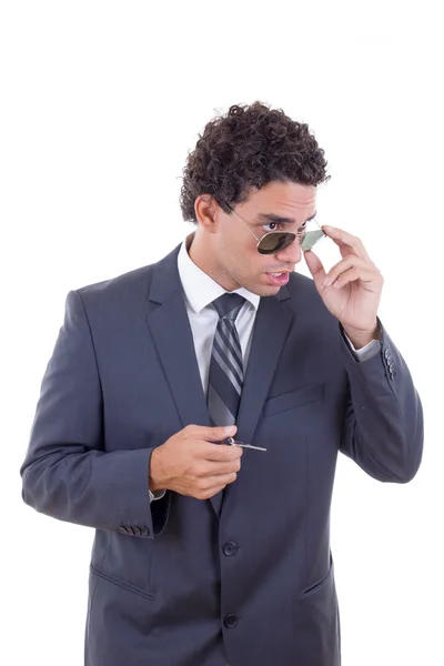 Surprised businessman with glasses holding keys — Stock Photo, Image