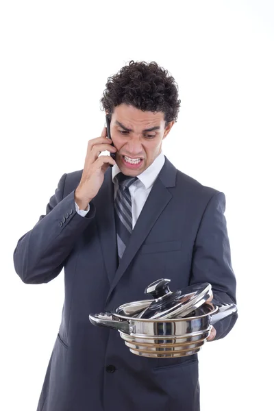 Angry man seeking lunch on mobile phone — Stock Photo, Image