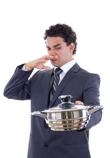 Hombre sosteniendo una olla para cocinar que realmente apesta —  Fotos de Stock