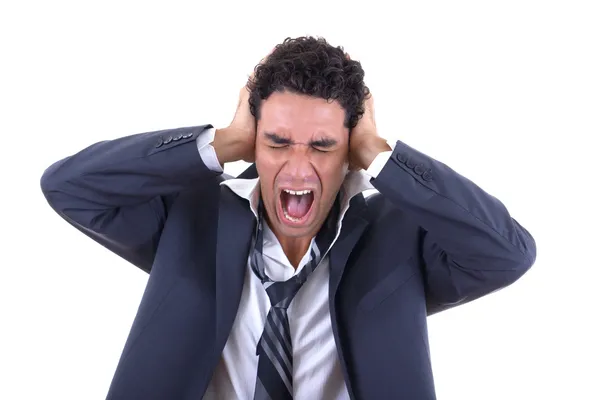 Hombre sosteniendo su cabeza y gritando — Foto de Stock