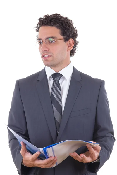 Young businessman holding an open notebook Royalty Free Stock Photos