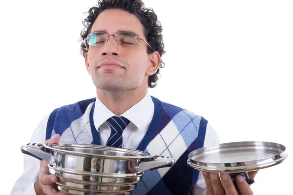 Man smelling lunch from pot — Stock Photo, Image