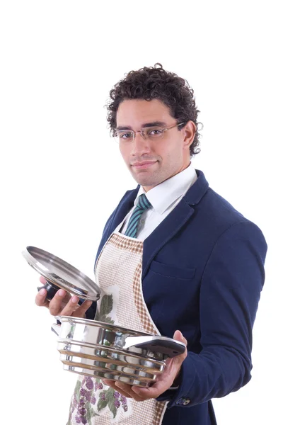 Homem com um avental segurando uma panela de cozinha — Fotografia de Stock