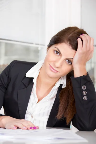 Business woman at home in suit — Stock Photo, Image