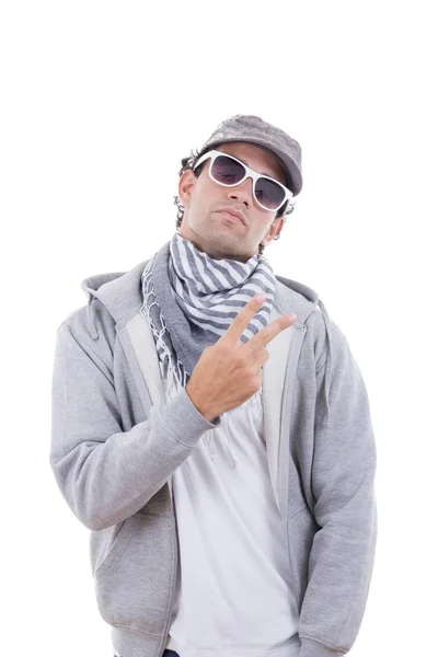 Cool man in gray sweatshirt wearing sunglasses and cap with scar — Stock Photo, Image