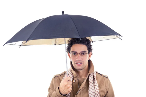 Man holding umbrella in jacket with scarf wearing glasses — Stock Photo, Image