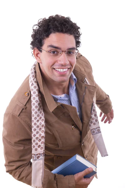 Man in coat holding a book — Stock Photo, Image