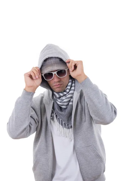 Modern gangster in sweatshirt with hood and sunglasses — Stock Photo, Image