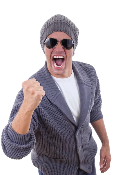 Successful fashion male model in sweater with sunglasses and cap — Stock Photo, Image