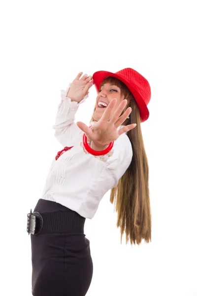 Симпатичная девушка в красной шляпе, показывающая остановку рукой — стоковое фото