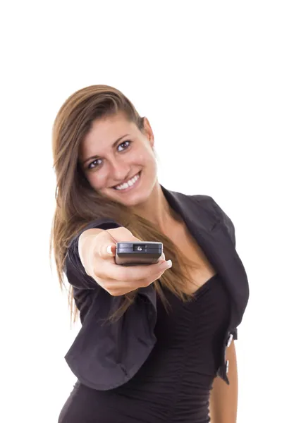 Sorridente mulher de negócios com tv remoto — Fotografia de Stock