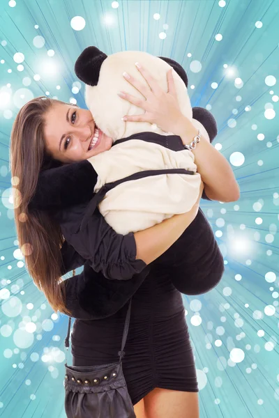 Leende glada affärskvinna kramar nallebjörn — Stockfoto
