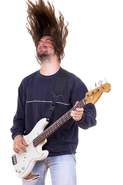 Mężczyzna muzyk gra gitara basowa z włosów — Zdjęcie stockowe