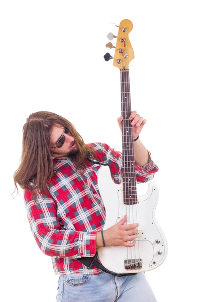 Man in shirt playing electric bass guitar — Stock Photo, Image