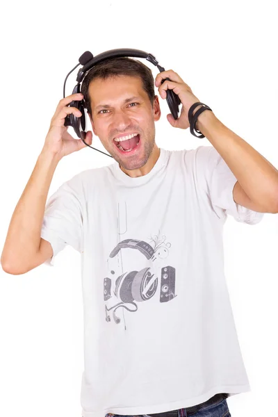 Νεαρός άνδρας με ακουστικά φωνάζοντας — Φωτογραφία Αρχείου