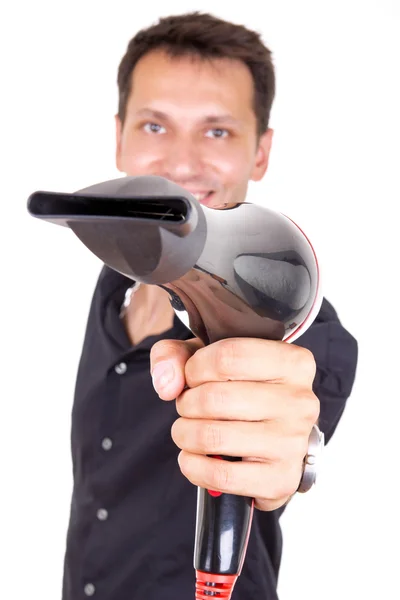 Hairdresser holding professional blow dryer — Stock Photo, Image