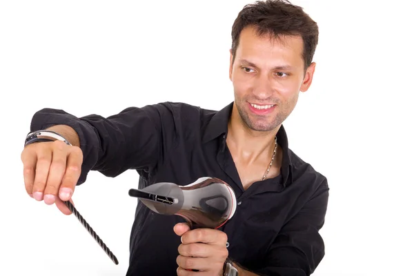 Stylist with blow dryer and comb for hair — Stock Photo, Image