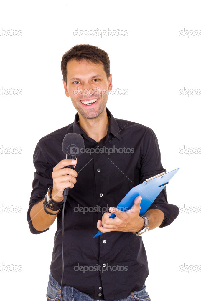 young business man with notes announcing on microphone