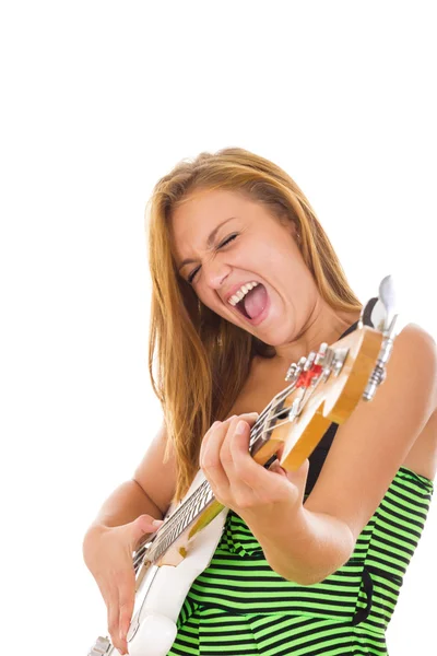 Woman in green dress playing electric bass guitar — Stock Photo, Image