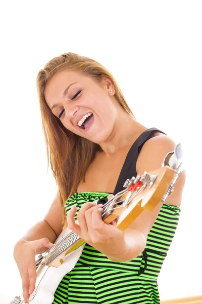 Woman playing electric guitar — Stock Photo, Image