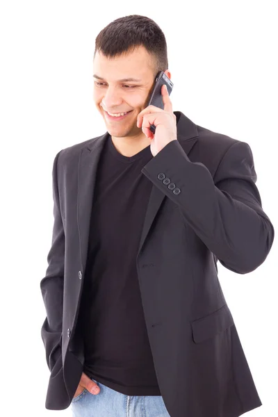 Hombre casual en un traje hablando por móvil y sonriendo —  Fotos de Stock