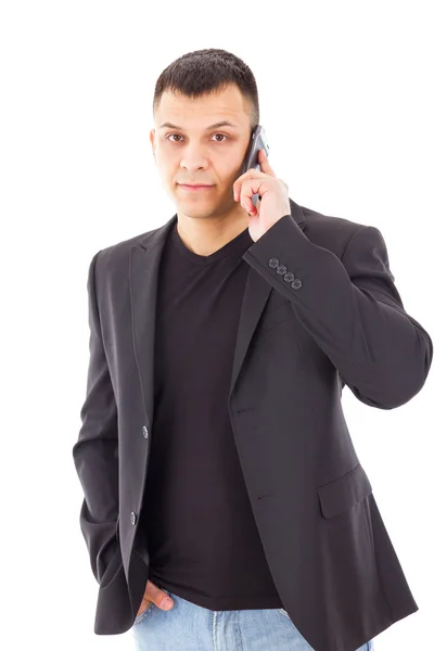 Man in a suit talking over mobile — Stock Photo, Image