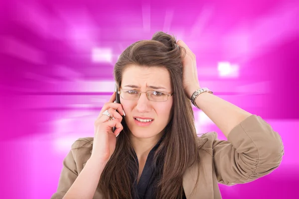 Woman hearing bad news over phone — Stock Photo, Image